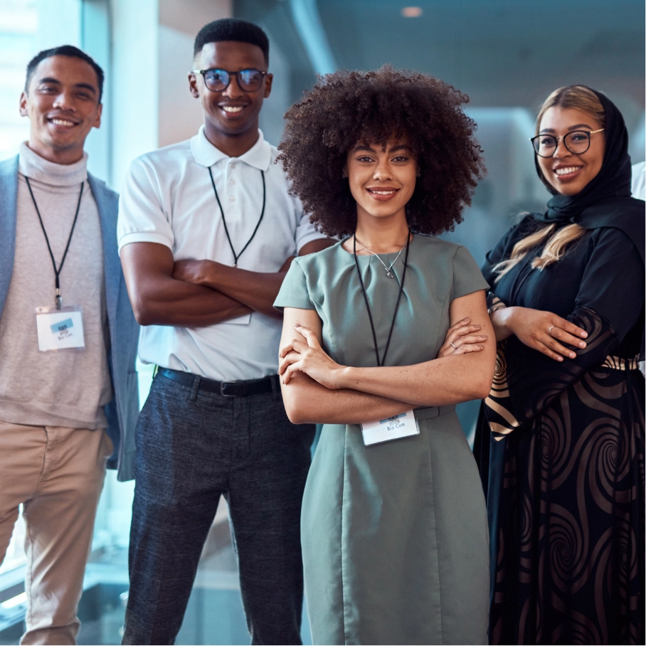 Two women looking upward in green and pink