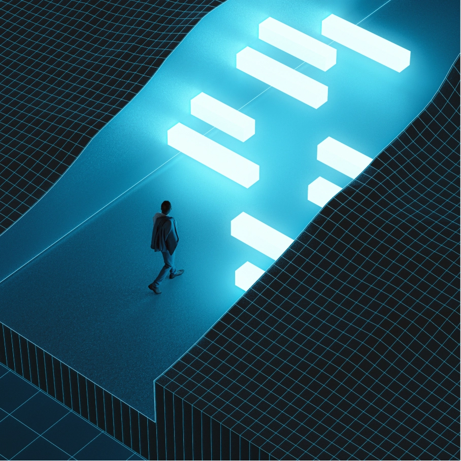 Person in blue sitting on green field